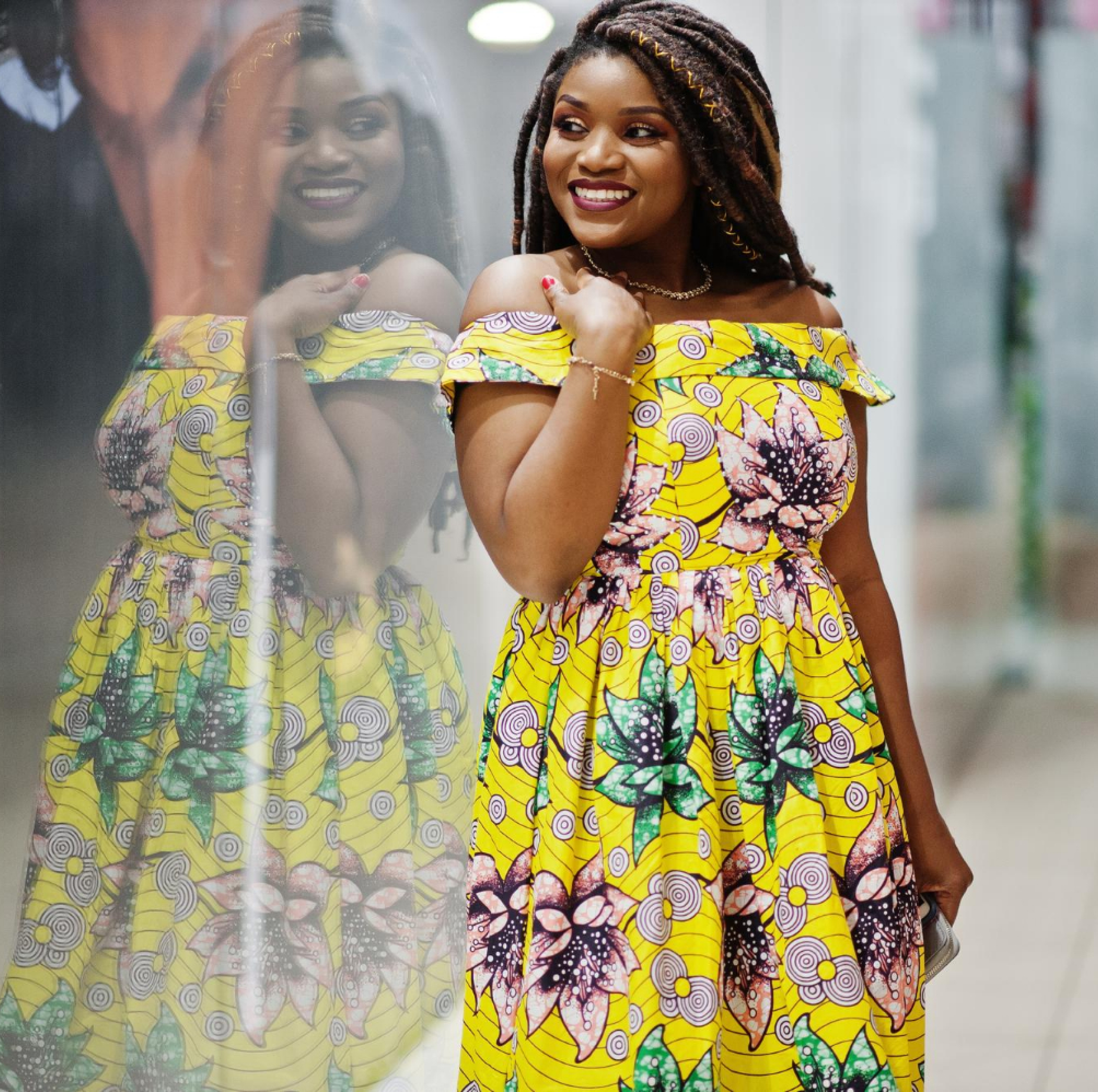 Cute Small Height African American Girl With Dreadlocks Wear Coloured Yellow Dress Posed Shop Showcase Trade Center 1